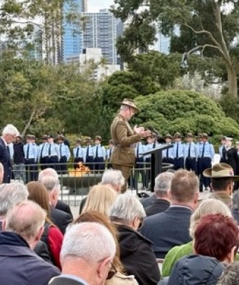Fr Brendand QUirk saying the Prayer at the official annual Battle for Australia Commemoration ceremony at the Shrine of Remembrance in Melbourne Victoria Australia