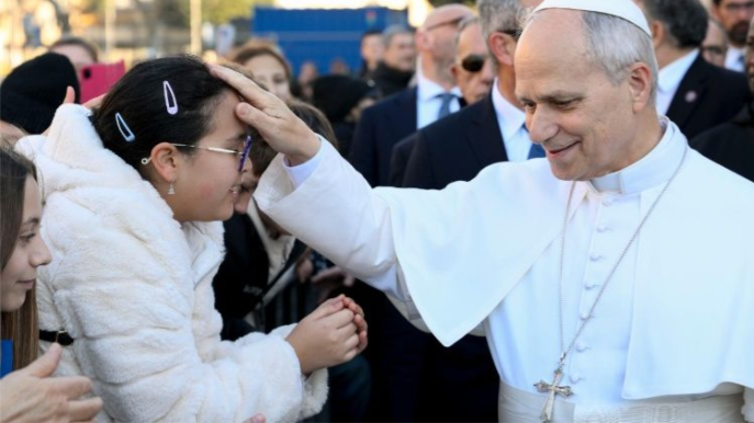 The Pope in the courtyard of St. Mary Queen of Peace in Ostia.