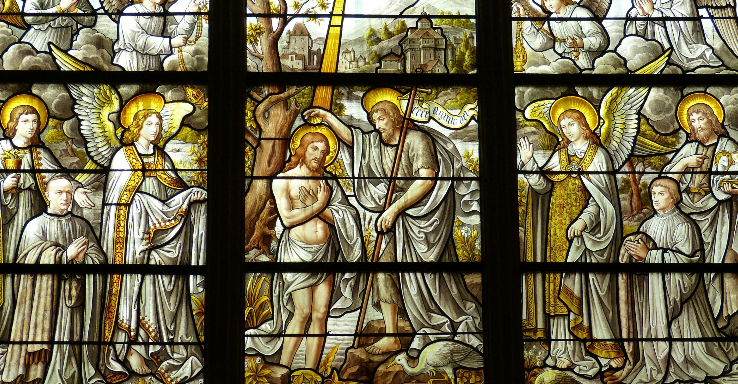 Jesus being baptised by St John stain glass window